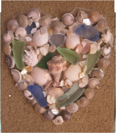 Beautiful heart of shells on a sand background. Complete with pictorial tutorial!