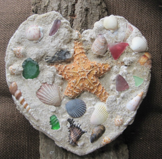 How to-tutorial on how to make this sand cast, shell and seaglass heart. www.shellcrafter.com