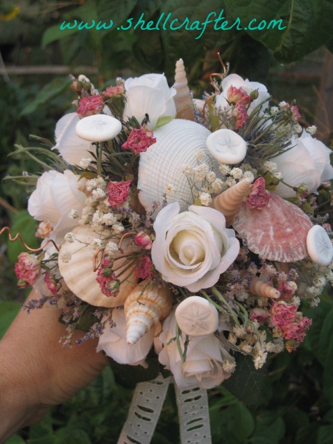 Awesome shell and flower bridal bouquet. This site has an amazing tutorial to make your own bridal bouquet! www.shellcrafter.com